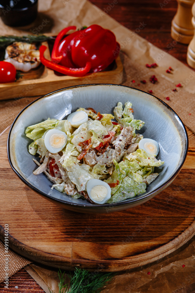 salad with quail eggs and dried tomatoes. Top view salad with quail eggs and dried tomatoes. Top view