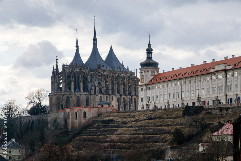 Kutna Hora, Central Bohemian, Czech Republic, 5 March 2022: St. Barbara's Church with lancet windows, Unique gothic stone cathedral and Former Jesuit College, baroque statues, arches and buttresses