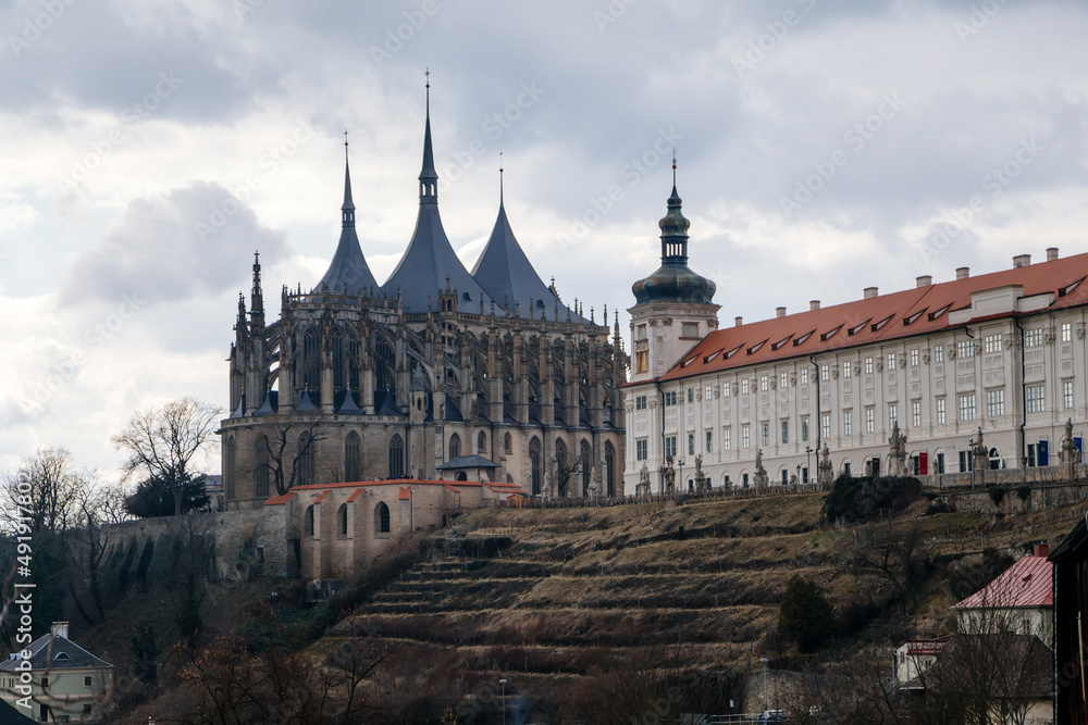 Kutna Hora, Central Bohemian, Czech Republic, 5 March 2022: St. Barbara's Church with lancet windows, Unique gothic stone cathedral and Former Jesuit College, baroque statues, arches and buttresses Kutna Hora, Central Bohemian, Czech Republic, 5 March 2022: St. Barbara's Church with lancet windows, Unique gothic stone cathedral and Former Jesuit College, baroque statues, arches and buttresses