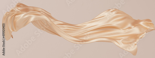 Gold silk fabric design element, 3d rendering golden cloth material flying in the wind photo