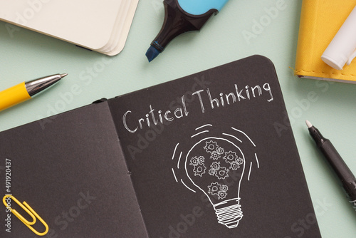 Critical Thinking is shown on the photo using the text and picture of lamp