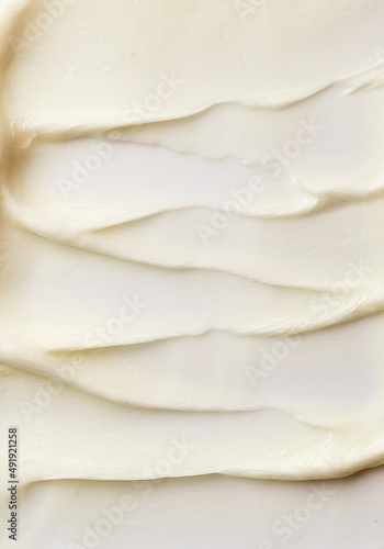 Thick creamy texture background. Smooth lotion or cream pattern of texture. Macro shot. 