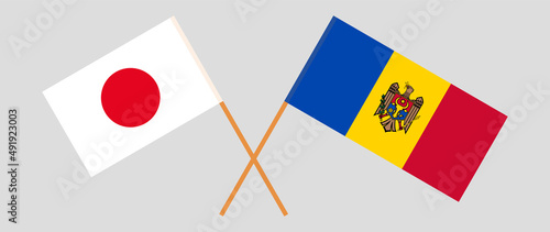 Crossed flags of Japan and Moldova. Official colors. Correct proportion