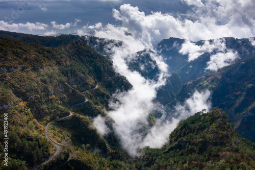 View into the valley of nuns in Madeira, Portugal. Mountains with dramatic clouds. 