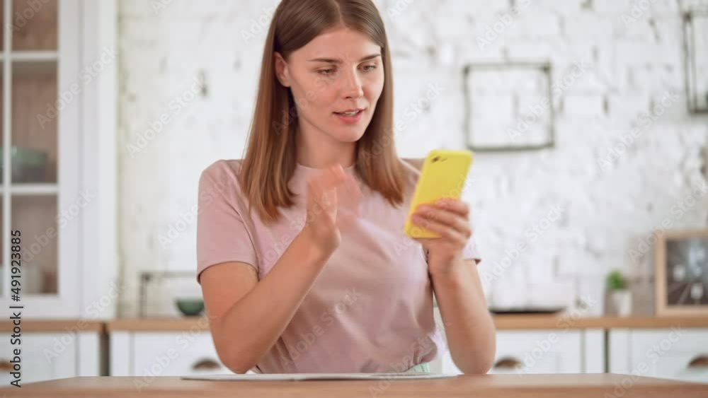 young woman take a selfie using smartphone make funny face make funny face joyful blonde have fun at home young woman take a selfie using smartphone make funny face make funny face joyful blonde have fun at home