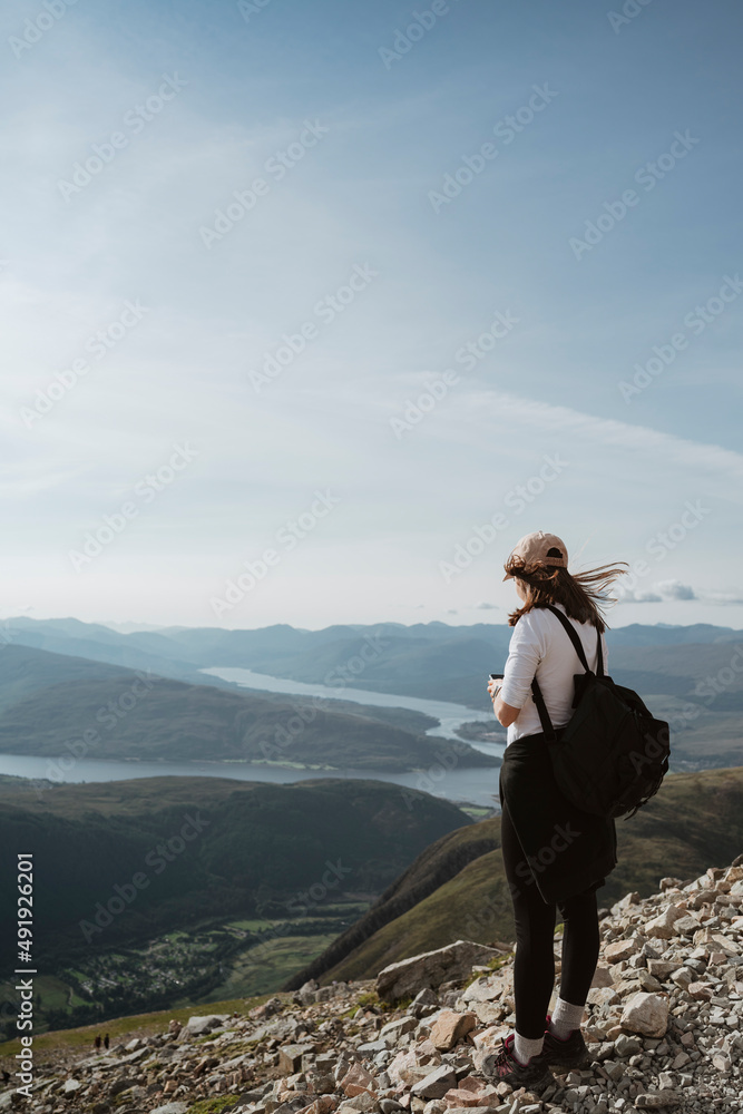  person on the top of mountain  Ben Nevis Scotland