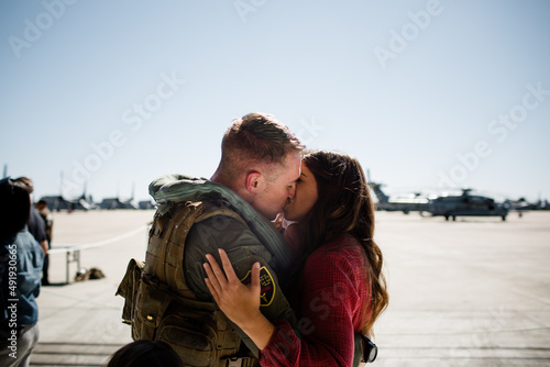 Husband & Wife Reuniting on Military Base in San Diego photo