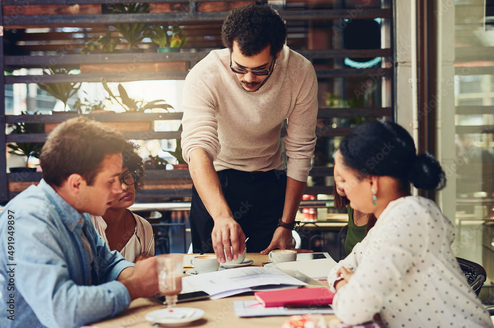Working on these stats together will make it better. Cropped shot of designers having a meeting at a coffee shop. Working on these stats together will make it better. Cropped shot of designers having a meeting at a coffee shop.