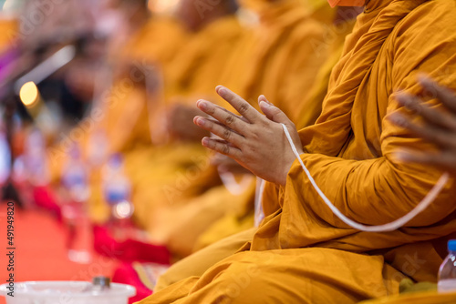 Fototapet Pray of monks on ceremony of buddhist in Thailand