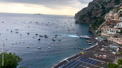 Looking down at sunset on Amalfi Coast at Spiaggia Grande beach in Positano Italy photo