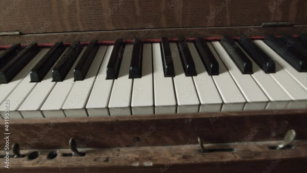 Old 20th century player piano, also known as pianola.
