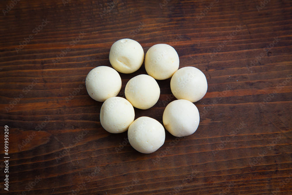 Traditional oriental appetizer kurt on a wooden background Traditional oriental appetizer kurt on a wooden background