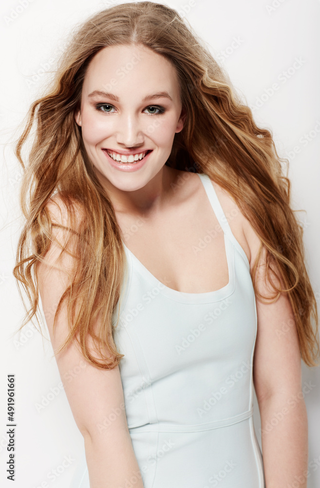 Just being me...and it feels awesome. Smiling young woman posing against a white background. Just being me...and it feels awesome. Smiling young woman posing against a white background.