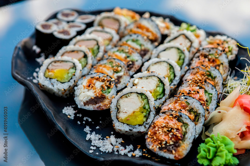 Overhead Japanese sushi food. Maki, rolls with crab, salmon, tuna