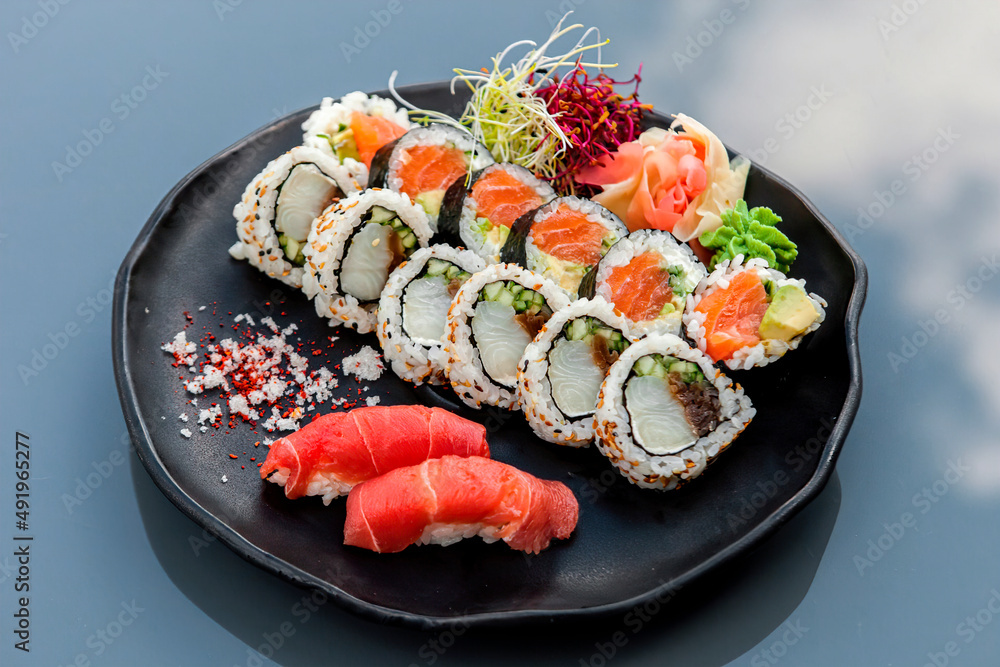 Overhead Japanese sushi food. Maki, rolls with crab, salmon, tuna