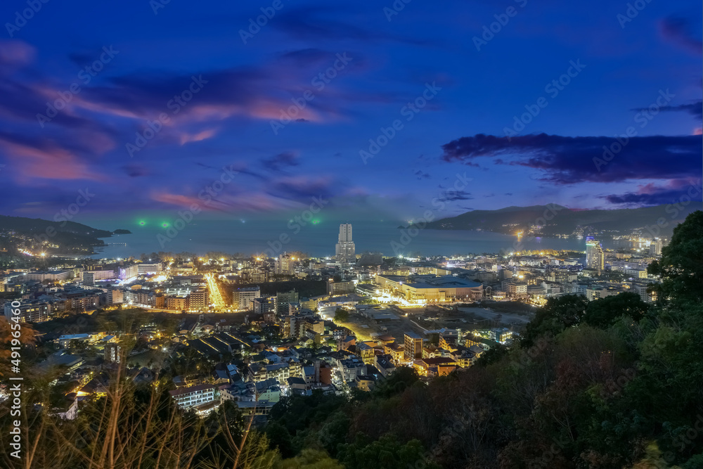 Obraz premium Colourful Sunset Patong Beach lovely vibrant orange, pink and Blue colours Phuket Thailand Thai 