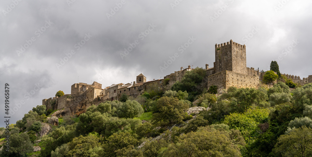 view of the castle of Castellar de la Frontera under an overcast expressive sky