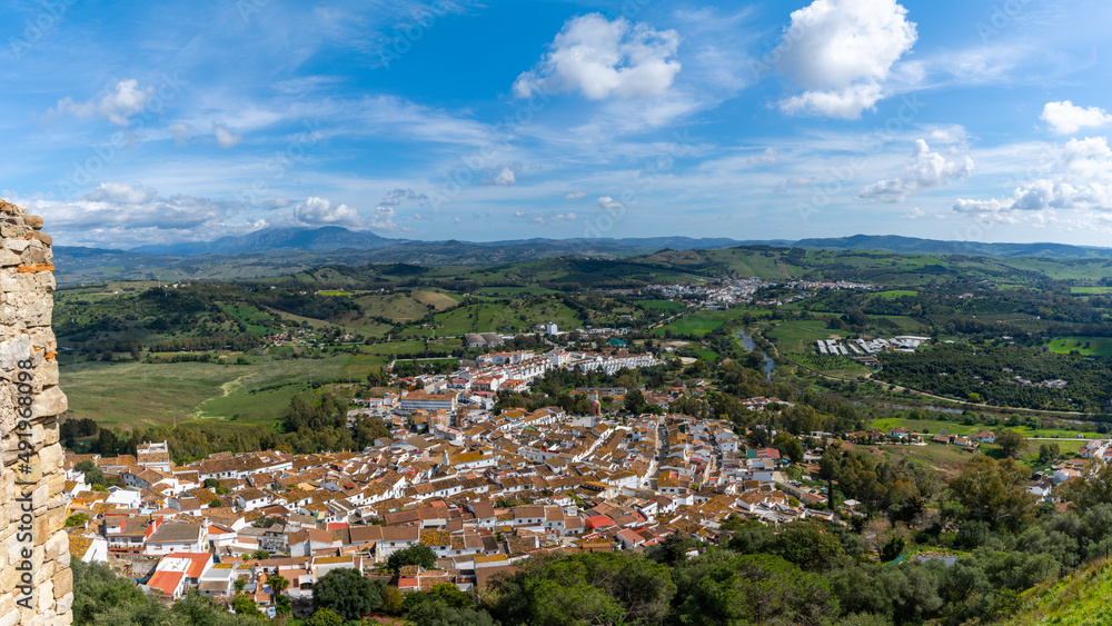 whitewashed village of Jimena de la Frontera high angle view with rooftops and countryside