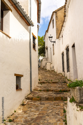narrow pedestrian street in the historic center of Castellar de la Frontera © makasana photo