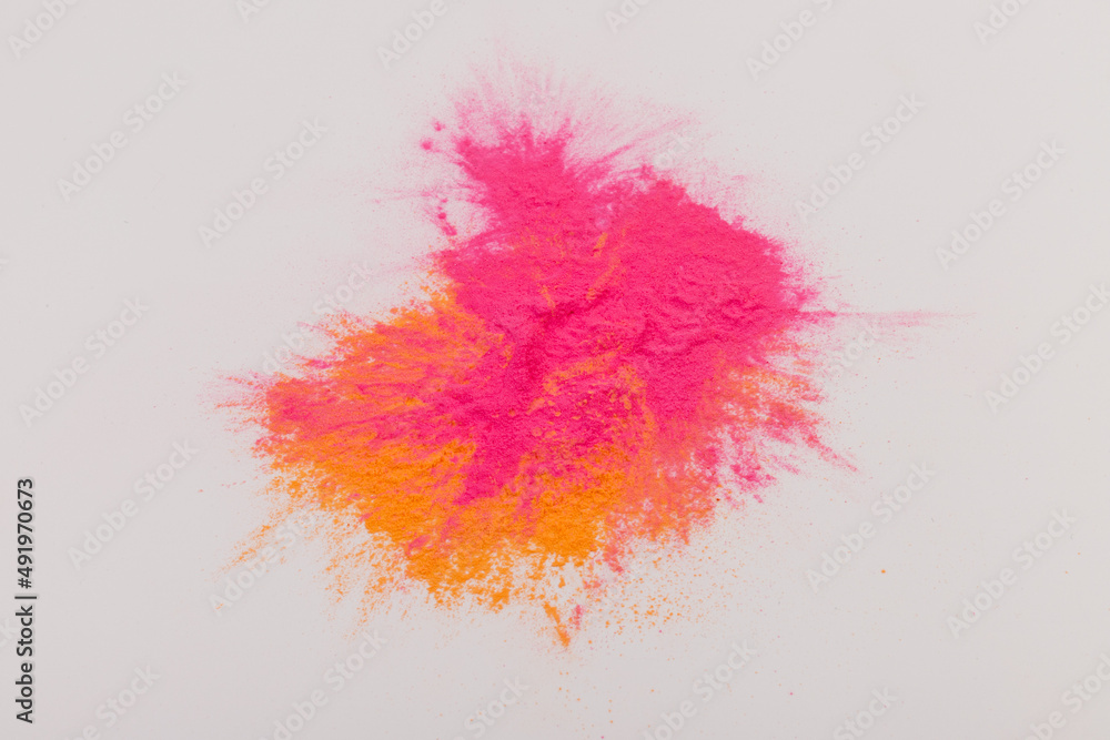 Abstract colorful Happy Holi background. Indian Holi festival of colours. Colorful powder explosion.
