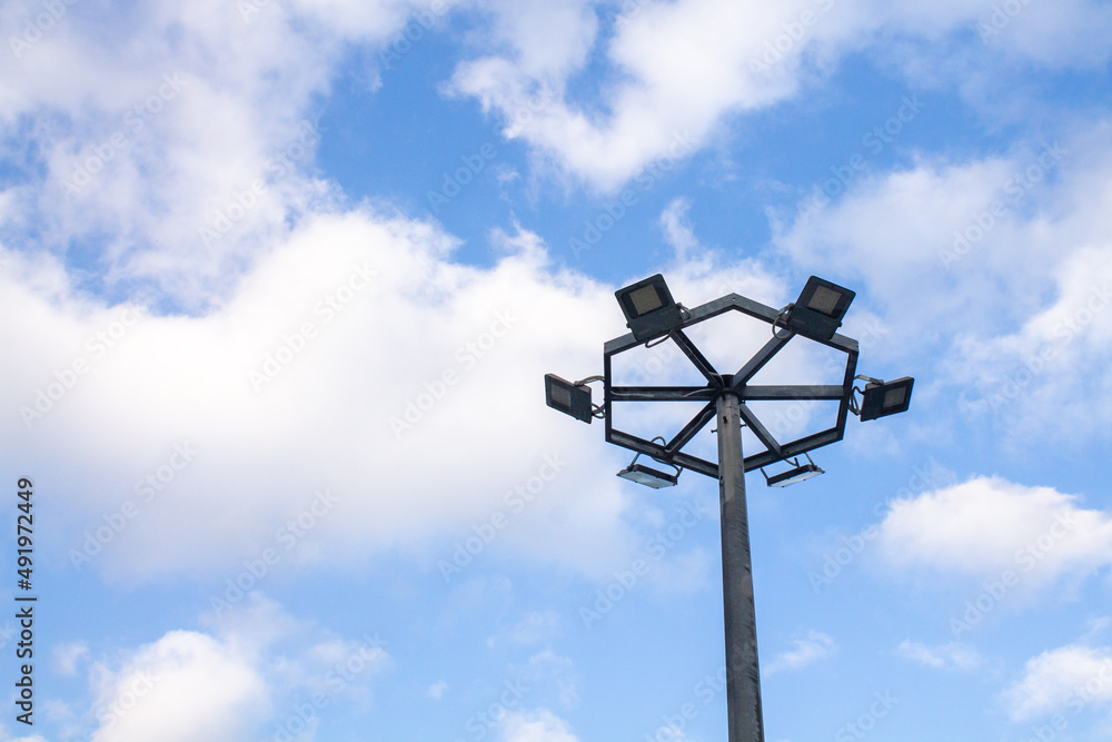 LED Circular light pole on sky background with copy space on the left LED Circular light pole on sky background with copy space on the left