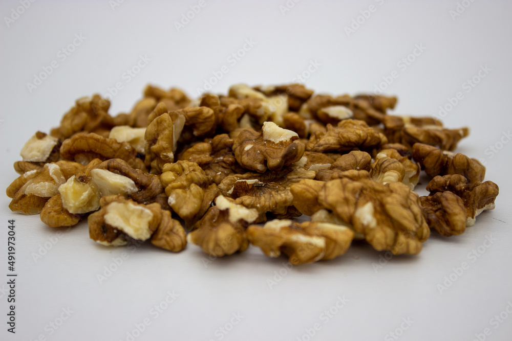Peeled walnuts on white background Peeled walnuts on white background