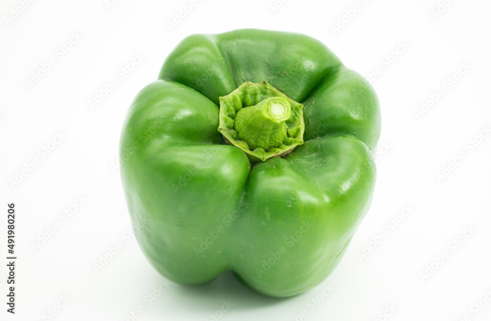Organic Green bell pepper isolated on white background, clipping path. Organic Green bell pepper isolated on white background, clipping path.