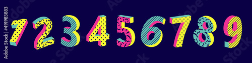 memphis-style numbers in neon colors on a dark background