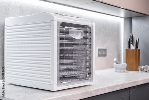 Modern dehydrator machine in kitchen