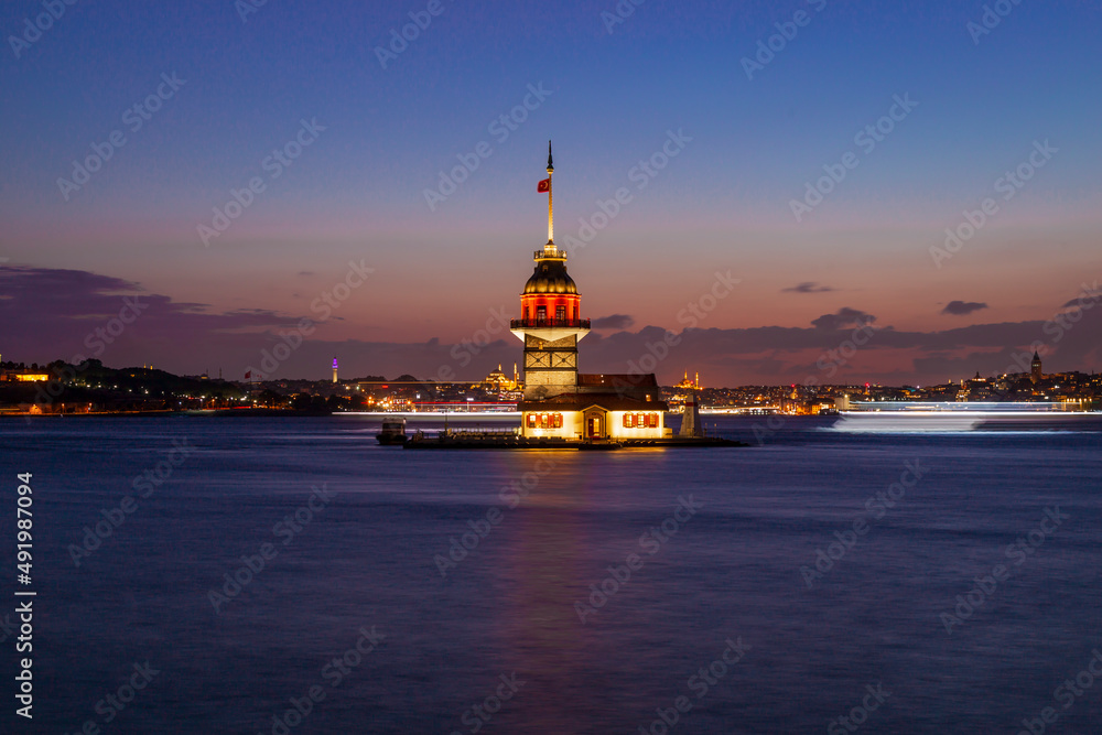 Maidens Tower at sunset, İstanbul. Beautiful clouds with blue sky. Historical light house of İstanbul