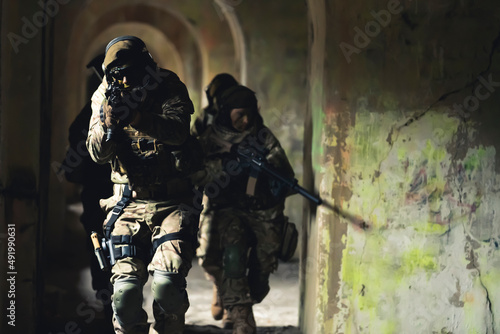 Insurgent rogue soldiers invading rebel property. High quality photo