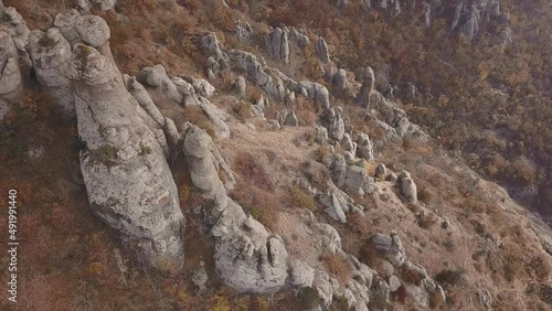 Wallpaper Mural Rising over extreme rocky outcrop of mountain range. Sharp steep mountain of rock formations for extreme mountaineering.  Torontodigital.ca
