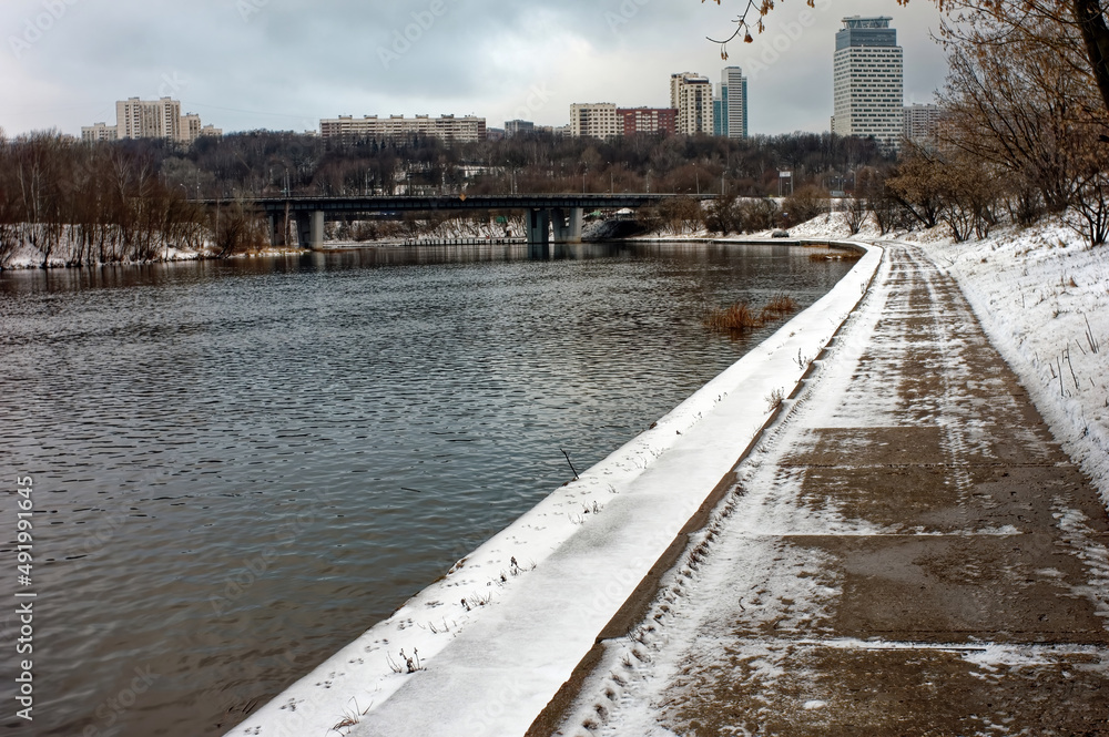 river bank on a cloudy winter day