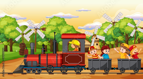 A kids in a train with natural scene