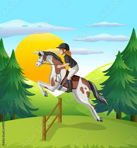 A girl riding on a horse at natural scene
