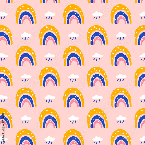 seamless pattern with rainbows and clouds