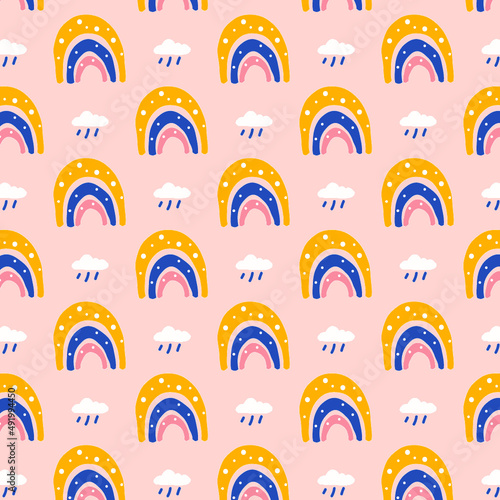 seamless pattern with rainbows and clouds