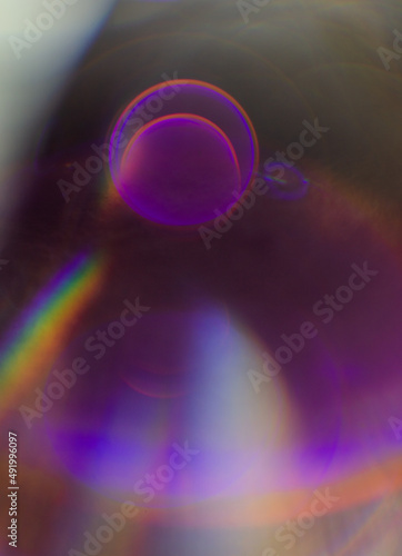 Defocus is the light flare of the lens. Lilac abstract background for overlay.