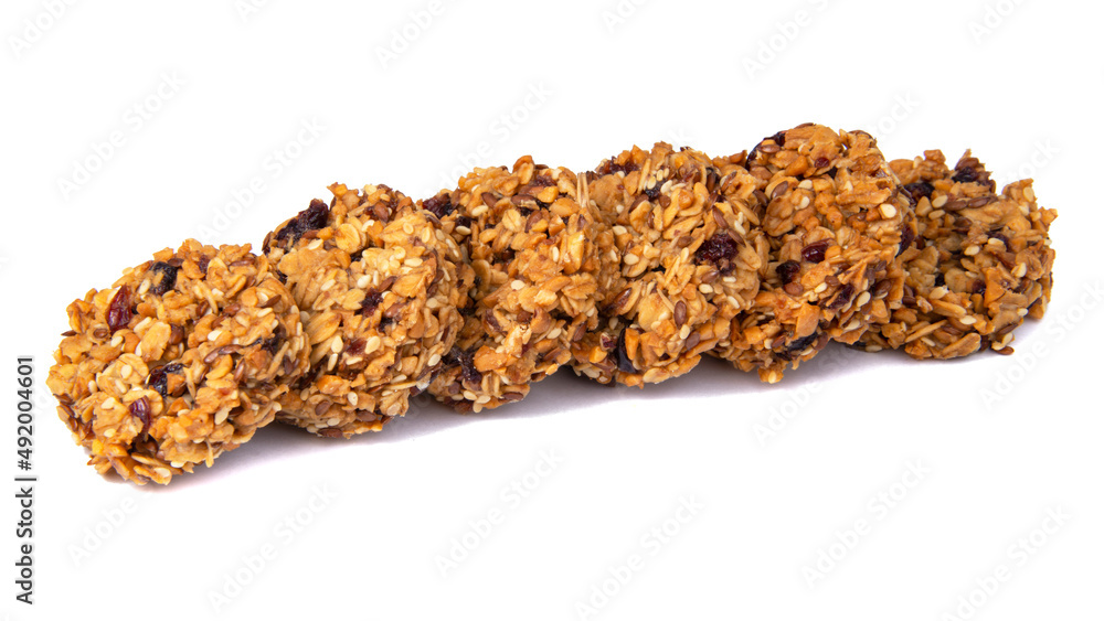 Cereal snack cookies no sugar with honey oatmeal grain isolated on the white Cereal snack cookies no sugar with honey oatmeal grain isolated on the white