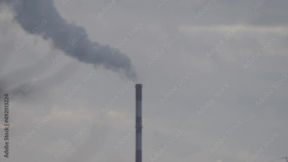 Timelapse of energy plant chimney releasing pollution Timelapse of energy plant chimney releasing pollution