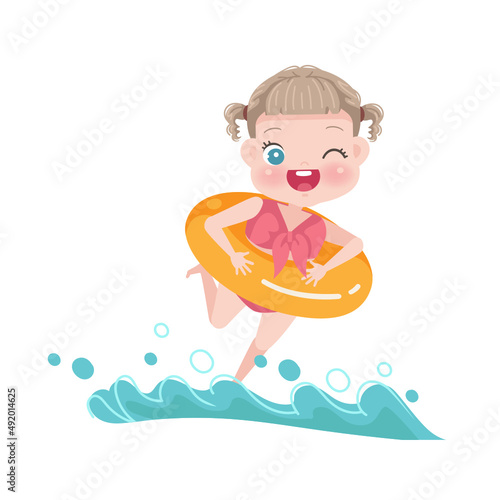 caucasian girl in a bathing suit wearing a rubber ring running on the beach