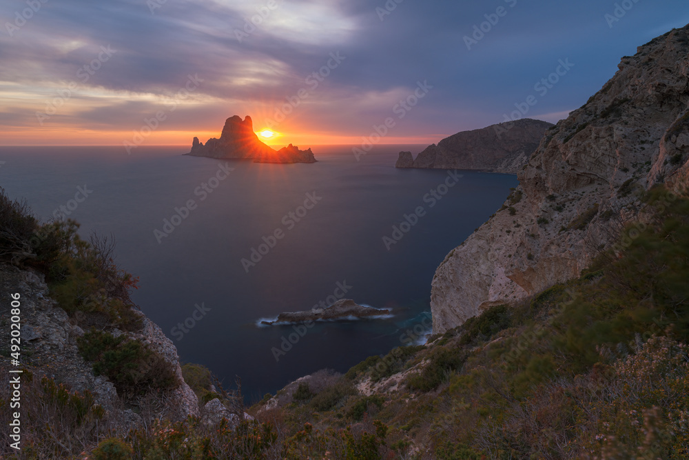 Sunset over the sea , Cap Llentrisca with  Es vedra island , Ibiza