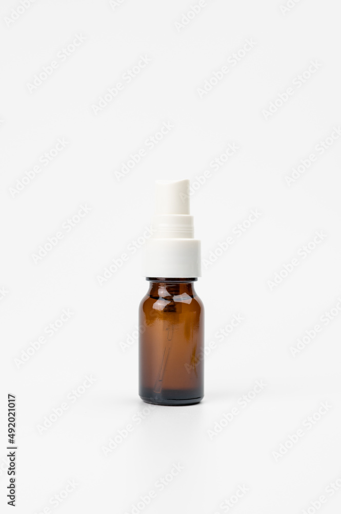Brown bottle that are used to hold medicines or cosmetics that are water-based Brown bottle that are used to hold medicines or cosmetics that are water-based