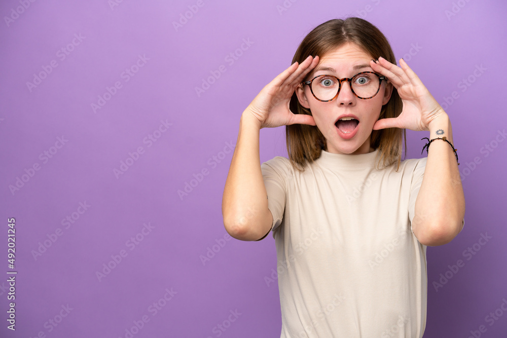 Young English woman isolated on purple background with surprise expression Young English woman isolated on purple background with surprise expression