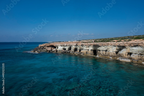 coast in ayia napa sea caves in cape greco in cyprus on the seashore with rocks