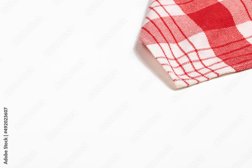 Fototapeta premium White background and rags with white and red squares in the upper right corner