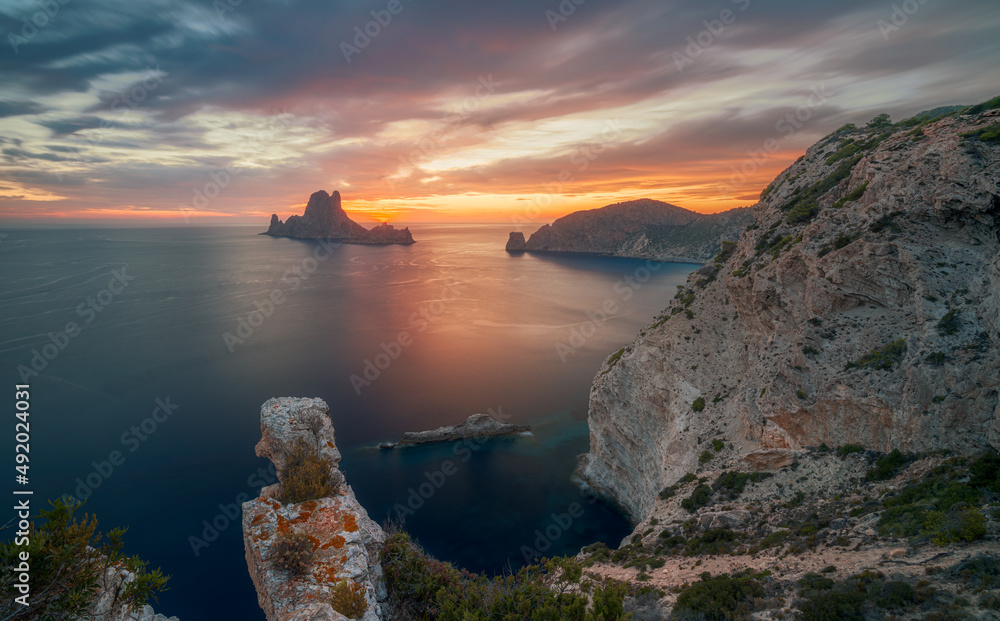 Sunset over the sea , Cap Llentrisca with es vedra island , Ibiza