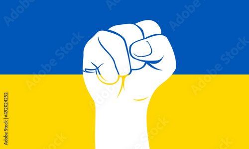 Graphics of a human fist on the background of the flag of Ukraine. The strength of the Ukrainian people. War between Russia and Ukraine. Solidarity with Ukraine