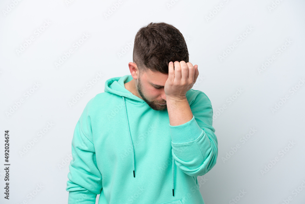 Young caucasian man isolated on white background with headache Young caucasian man isolated on white background with headache