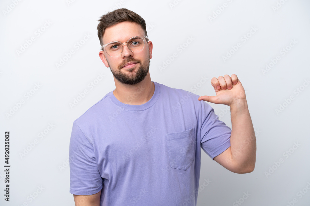Young caucasian man isolated on white background proud and self-satisfied Young caucasian man isolated on white background proud and self-satisfied